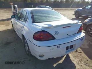 2001 Pontiac Grand Am GT with VIN 1G2NW52E11C244447, listed as a IAAI auction lot 41697883 with 81,983 mi miles. Bid and sale history available at carsss.com. Image 3.