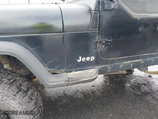 1995 Jeep Wrangler S with VIN 1J4FY19P0SP258399, listed as a IAAI auction lot 41970320 with 151,621 mi miles. Bid and sale history available at carsss.com. Image 16.