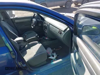 2005 Suzuki Forenza S z VIN KL5JD56Z85K111425, wystawiony jako IAAI lot #41421881 z przebiegiem 18 478 mil mil oraz . Historia ofert i sprzedaży dostępna na DreamBid. Obrazek 5.