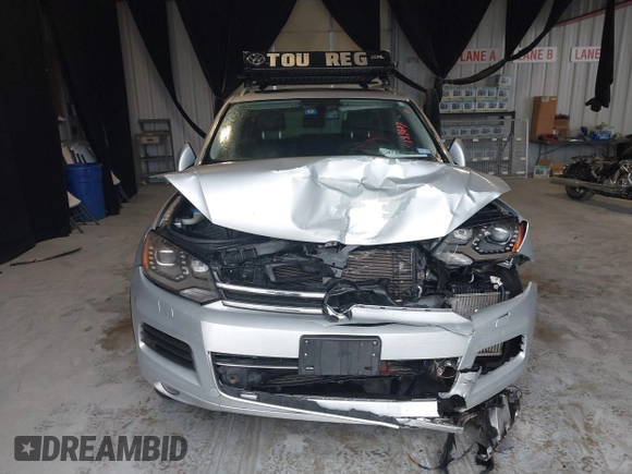 2011 Volkswagen Touareg Exec with VIN WVGFK9BP4BD005986, listed as a IAAI auction lot 41183877 with 109,005 mi miles and . Bid and sale history available at DreamBid. Image 12.