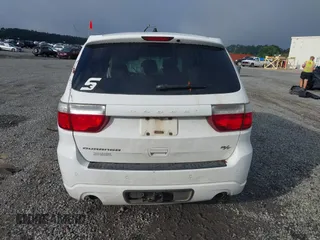2013 Dodge Durango R/T with VIN 1C4SDHCT4DC648639, listed as a IAAI auction lot 42504044 with 193,909 mi miles and . Bid and sale history available at DreamBid. Image 16.