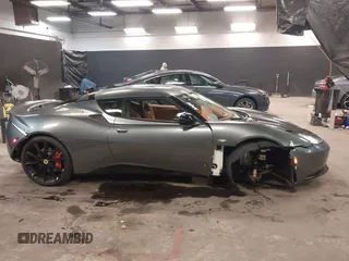 2013 Lotus Evora z VIN SCCLMDSU7DHA10025, wystawiony jako IAAI lot #41298776 z przebiegiem 18 194 mil mil oraz . Historia ofert i sprzedaży dostępna na DreamBid. Obrazek 13.