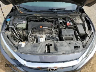 2017 Honda Civic LX z VIN 19XFC2F55HE214470, wystawiony jako Copart lot #57785675 z przebiegiem 81 862 mil mil oraz Szkoda całkowita • Salvage title. Historia ofert i sprzedaży dostępna na DreamBid. Obrazek 11.