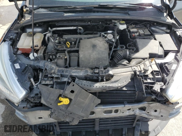 2018 Ford Focus SE z VIN 1FADP3F24JL204488, wystawiony jako Copart lot #54733625 z przebiegiem Nie podano mil oraz Szkoda całkowita • Salvage title. Historia ofert i sprzedaży dostępna na DreamBid. Obrazek 11.