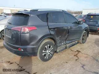 2018 Toyota RAV4 LE with VIN JTMZFREV4JJ183106, listed as a IAAI auction lot 41449468 with 114,719 mi miles. Bid and sale history available at carsss.com. Image 4.
