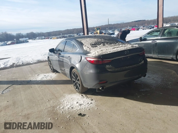 2021 Mazda 6 Carbon Edition with VIN JM1GL1WY6M1616617, listed as a IAAI auction lot 41365615 with 60,747 mi miles and . Bid and sale history available at DreamBid. Image 3.