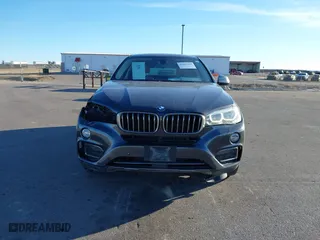 2015 BMW X6 xDrive35i with VIN 5UXKU2C50F0N77926, listed as a IAAI auction lot 41681268 with 136,118 mi miles. Bid and sale history available at carsss.com. Image 12.