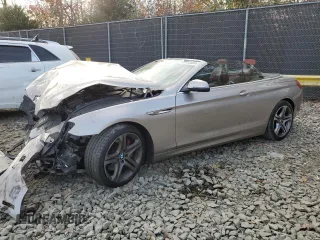 2016 BMW 6 Series 650i xDrive z VIN WBA6F7C50GD930473, wystawiony jako Copart lot #79723834 z przebiegiem 100 131 mil mil oraz Szkoda całkowita • Salvage title. Historia ofert i sprzedaży dostępna na DreamBid. Obrazek 1.
