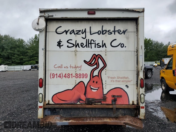 2005 Ford Econoline Cargo z VIN 1FDNE35L05HA95742, wystawiony jako Copart lot #56768625 z przebiegiem 130 000 mil mil oraz Czysty tytuł • Clean title. Historia ofert i sprzedaży dostępna na DreamBid. Obrazek 6.