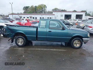 1997 Ford Ranger XL with VIN 1FTCR14A6VTA51245, listed as a IAAI auction lot 41807907 with 239,124 mi miles. Bid and sale history available at carsss.com. Image 13.