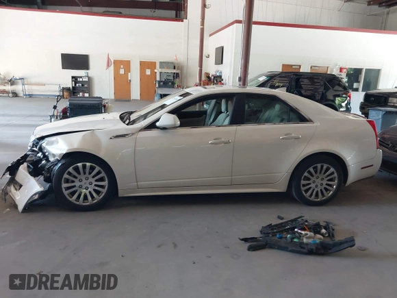 2010 Cadillac CTS Premium with VIN 1G6DS5EV8A0142811, listed as a IAAI auction lot 42562666 with 177,963 mi miles and . Bid and sale history available at DreamBid. Image 14.