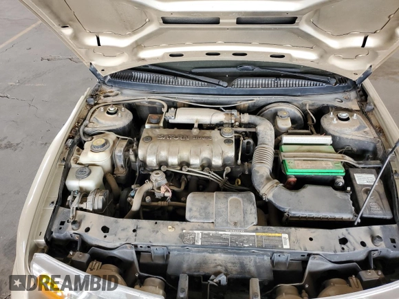 2002 Saturn SL z VIN 1G8ZH52842Z165459, wystawiony jako Copart lot #57273035 z przebiegiem 84 482 mil mil oraz Szkoda całkowita • Salvage title. Historia ofert i sprzedaży dostępna na DreamBid. Obrazek 11.