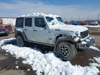 2024 Jeep Wrangler Rubicon with VIN 1C4PJXFG1RW271510, listed as a IAAI auction lot 41626295 with 25,927 mi miles. Bid and sale history available at carsss.com. Image 1.