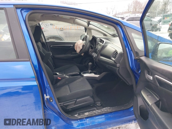 2020 Honda Fit LX z VIN 3HGGK5H43LM716911, wystawiony jako IAAI lot #41410480 z przebiegiem 71 983 mil mil oraz . Historia ofert i sprzedaży dostępna na DreamBid. Obrazek 5.