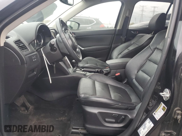 2013 Mazda CX-5 Grand Touring with VIN JM3KE4DE8D0161586, listed as a Copart auction lot 52641145 with 134,290 mi miles and Salvage Title. Bid and sale history available at carsss.com. Image 7.
