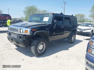 2005 Hummer H2 SUV with VIN 5GRGN23U25H128791, listed as a IAAI auction lot 42115436 with 286,818 mi miles. Bid and sale history available at carsss.com. Image 2.