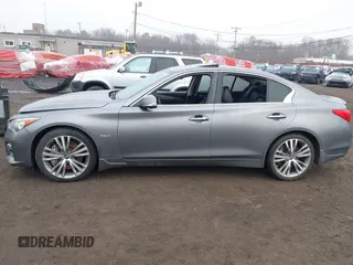 2016 Infiniti Q50 3.0t Red Sport 400 with VIN JN1FV7AR3GM451964, listed as a IAAI auction lot 41715544 with 164,139 mi miles. Bid and sale history available at carsss.com. Image 13.