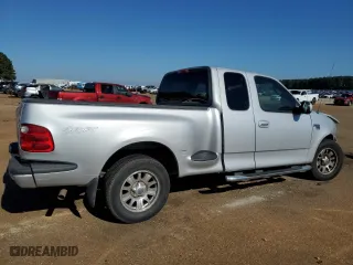 2003 Ford F-150 XL with VIN 1FTRX07W33KB36757, listed as a Copart auction lot 82878694 with 0 mi miles and Salvage Title. Bid and sale history available at carsss.com. Image 3.