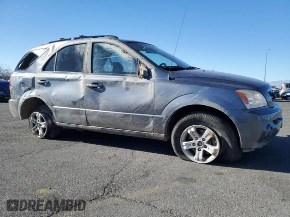 2005 Kia Sorento LX with VIN KNDJD733X55410306, listed as a Copart auction lot 45815005 with 104,153 mi miles and Salvage Title. Bid and sale history available at DreamBid. Image 4.