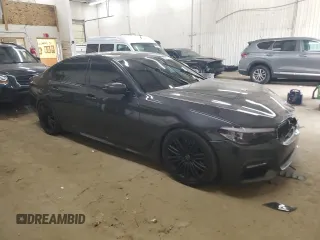 2018 BMW 5 Series 540i xDrive z VIN WBAJE7C59JWC56481, wystawiony jako Copart lot #50831085 z przebiegiem 105 558 mil mil oraz Szkoda całkowita • Salvage title. Historia ofert i sprzedaży dostępna na DreamBid. Obrazek 4.