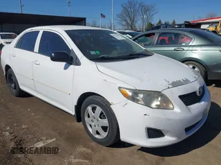 2010 Toyota Corolla with VIN 1NXBU4EE5AZ252874, listed as a IAAI auction lot 41812683 with 135,492 mi miles. Bid and sale history available at carsss.com. Image 1.
