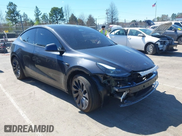 2024 Tesla Model Y Performance with VIN 7SAYGDEF1RA329825, listed as a IAAI auction lot 41762602 with 3,923 mi miles and . Bid and sale history available at DreamBid. Image 1.