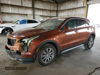 2020 Cadillac XT4 FWD Premium Luxury with VIN 1GYFZCR47LF112796, listed as a Copart auction lot 45286765 with 104,681 mi miles and Salvage Title. Bid and sale history available at carsss.com. Image 1.