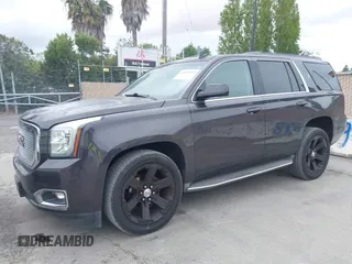 2015 GMC Yukon SLT with VIN 1GKS1BKC6FR245564, listed as a IAAI auction lot 42139295 with 149,088 mi miles. Bid and sale history available at carsss.com. Image 17.