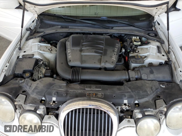 2000 Jaguar S-Type V8 z VIN SAJDA01D7YGL39410, wystawiony jako Copart lot #56814185 z przebiegiem 47 861 mil mil oraz Szkoda całkowita • Salvage title. Historia ofert i sprzedaży dostępna na DreamBid. Obrazek 11.