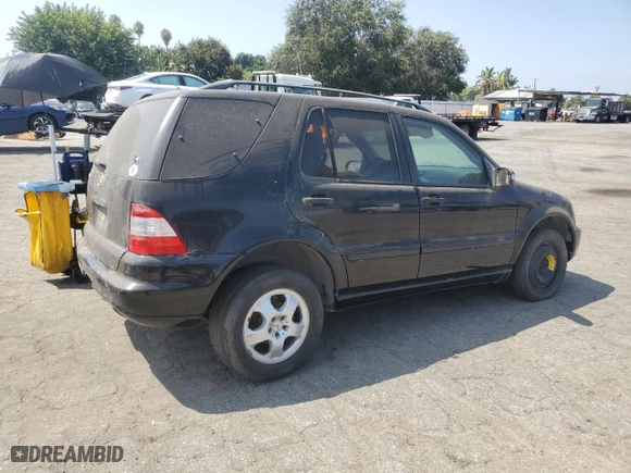 2002 Mercedes-Benz M-Class with VIN 4JGAB54E32A338132, listed as a Copart auction lot 67854164 with 0 mi miles and Salvage Title. Bid and sale history available at carsss.com. Image 3.