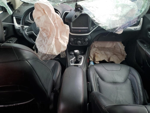 2014 Jeep Cherokee Trailhawk with VIN 1C4PJMBB2EW173458, listed as a Copart auction lot 56146355 with Not provided miles and Salvage title. Bid and sale history available at DreamBid. Image 8.