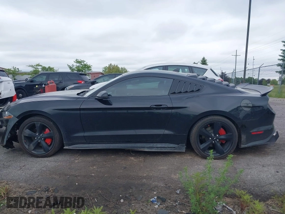 2021 Ford Mustang EcoBoost z VIN 1FA6P8TH7M5132841, wystawiony jako IAAI lot #42364830 z przebiegiem 22 331 mil mil oraz . Historia ofert i sprzedaży dostępna na DreamBid. Obrazek 14.