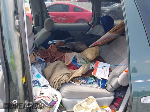 2002 Toyota Sienna LE with VIN 4T3ZF13C82U465948, listed as a IAAI auction lot 42264013 with 228,864 mi miles and . Bid and sale history available at DreamBid. Image 8.