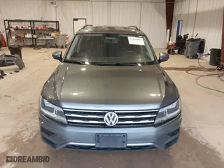 2018 Volkswagen Tiguan S with VIN 3VV1B7AX7JM106531, listed as a IAAI auction lot 41668403 with 119,885 mi miles. Bid and sale history available at carsss.com. Image 13.