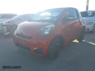 2012 Scion iQ with VIN JTNJJXB0XCJ018782, listed as a IAAI auction lot 41776080 with 73,359 mi miles. Bid and sale history available at carsss.com. Image 2.