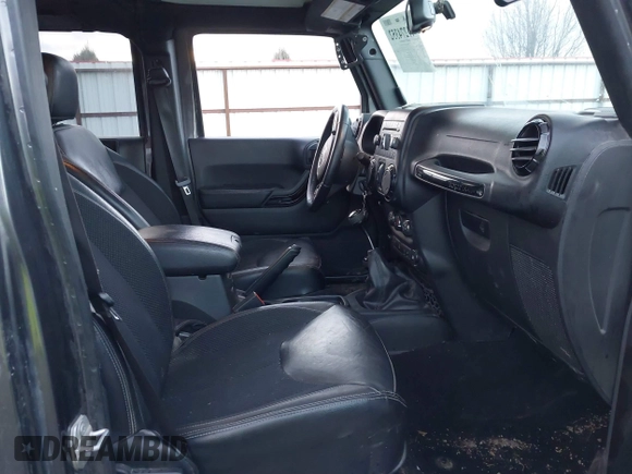 2017 Jeep Wrangler Unlimited Sahara with VIN 1C4BJWEG8HL638067, listed as a IAAI auction lot 41274352 with 57,339 mi miles. Bid and sale history available at carsss.com. Image 5.