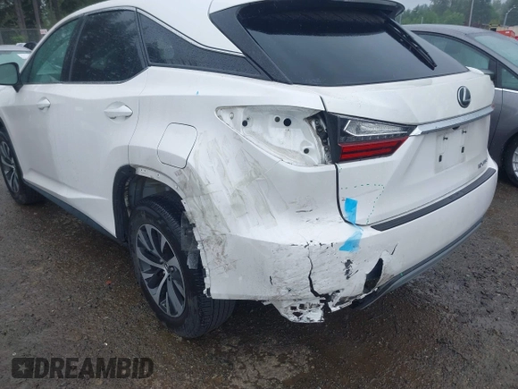 2022 Lexus RX 350 with VIN 2T2AZMDA4NC338692, listed as a IAAI auction lot 42338773 with 45,539 mi miles and . Bid and sale history available at DreamBid. Image 6.