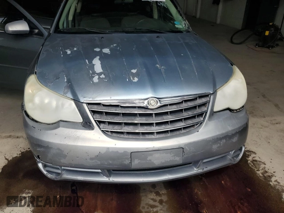 2007 Chrysler Sebring z VIN 1C3LC46K97N504536, wystawiony jako Copart lot #55334425 z przebiegiem 238 920 mil mil oraz Szkoda całkowita • Salvage title. Historia ofert i sprzedaży dostępna na DreamBid. Obrazek 11.
