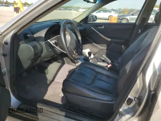 2004 Infiniti G35 w/Leather with VIN JNKCV51E24M111782, listed as a Copart auction lot 74676044 with 121,564 mi miles and Salvage Title. Bid and sale history available at DreamBid. Image 7.