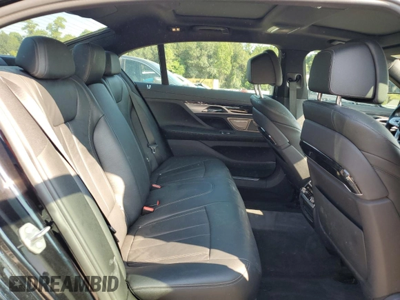2019 BMW 7 Series 740i with VIN WBA7E2C50KB216499, listed as a Copart auction lot 68828673 with 94,549 mi miles. Bid and sale history available at carsss.com. Image 10.