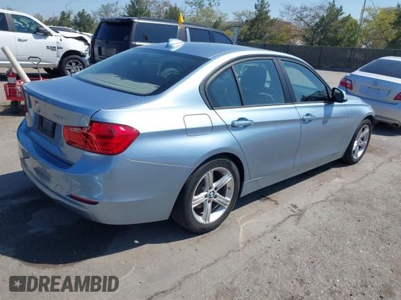 2014 BMW 3 Series 328i with VIN WBA3C1C51EK115278, listed as a IAAI auction lot 41979591 with 129,112 mi miles. Bid and sale history available at carsss.com. Image 4.