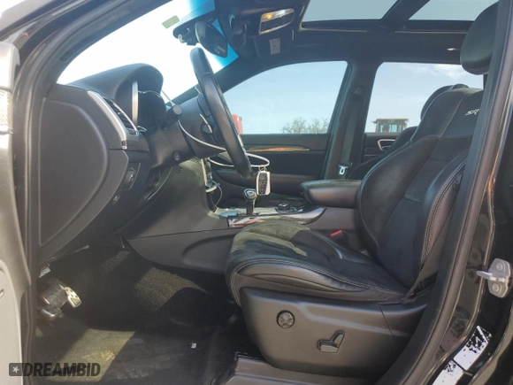 2015 Jeep Grand Cherokee SRT with VIN 1C4RJFDJXFC861588, listed as a Copart auction lot 51301235 with 35,927 mi miles and Clean Title. Bid and sale history available at carsss.com. Image 7.