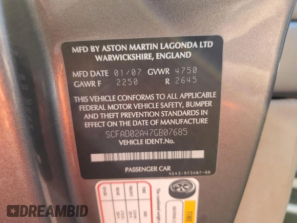 2007 Aston Martin DB9 z VIN SCFAD02A47GB07685, wystawiony jako Copart lot #75868414 z przebiegiem Nie podano mil oraz Szkody całkowita. Historia ofert i sprzedaży dostępna na DreamBid. Obrazek 12.