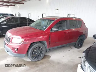 2014 Jeep Compass Sport with VIN 1C4NJCBA8ED821891, listed as a IAAI auction lot 41908178 with 178,772 mi miles. Bid and sale history available at carsss.com. Image 2.