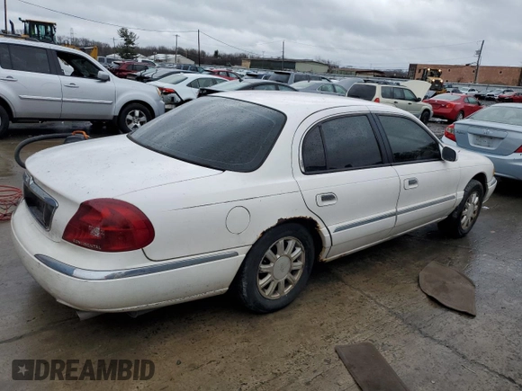 1999 Lincoln Continental with VIN 1LNHM97V3XY667567, listed as a Copart auction lot 84194854 with 137,163 mi miles and Salvage Title. Bid and sale history available at carsss.com. Image 3.