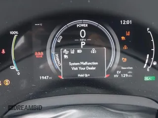 2024 Lexus RX 450h+ Luxury with VIN JTJCJMGA1R2021146, listed as a IAAI auction lot 42204669 with 1,947 mi miles and . Bid and sale history available at DreamBid. Image 16.