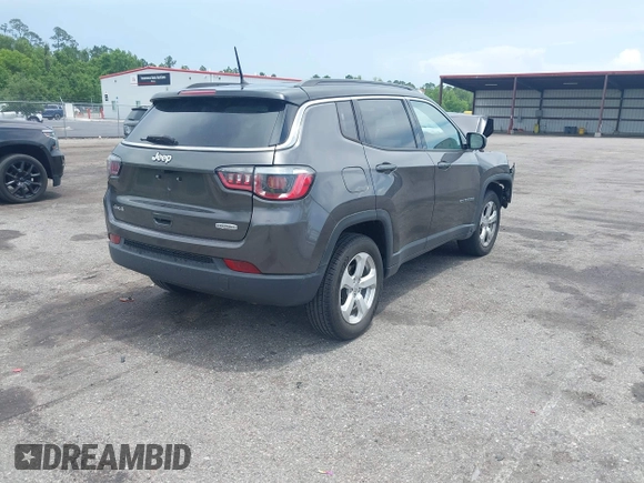 2018 Jeep Compass Latitude with VIN 3C4NJDBB6JT342520, listed as a IAAI auction lot 42464673 with 66,680 mi miles and . Bid and sale history available at DreamBid. Image 4.