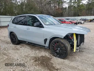 2024 BMW X5 M60i with VIN 5UX33EU08R9V21258, listed as a Copart auction lot 43411295 with 8,755 mi miles and Salvage Title. Bid and sale history available at carsss.com. Image 4.