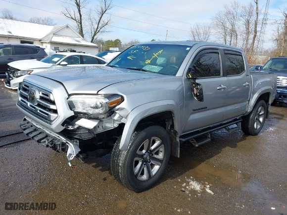 2019 Toyota Tacoma 4WD SR with VIN 3TMGZ5AN7KM287140, listed as a IAAI auction lot 41541937 with 41,843 mi miles. Bid and sale history available at carsss.com. Image 2.