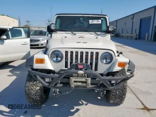 2004 Jeep Wrangler Rubicon z VIN 1J4FA69S34P757352, wystawiony jako Copart lot #52971745 z przebiegiem 139 855 mil mil oraz Szkoda całkowita • Salvage title. Historia ofert i sprzedaży dostępna na DreamBid. Obrazek 5.